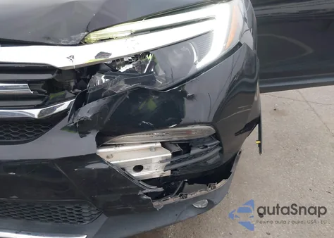 2017 Honda Pilot Touring z USA, uszkodzony, nr VIN 5FNYF5H9XHB031982